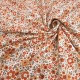 Jersey di Cotone H 150 cm - FIORELLINI RUGGINE/OCRA