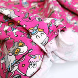 Jersey di Cotone Digital H 165 cm - UNICORNI MUSICISTI/FUXIA