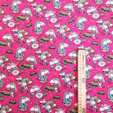 Jersey di Cotone Digital H 165 cm - UNICORNI MUSICISTI/FUXIA