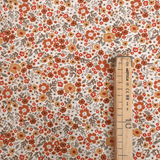 Jersey di Cotone H 150 cm - FIORELLINI RUGGINE/OCRA