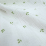 Mussola di Cotone Doppia Garza H 140 cm - FOGLIOLINE VERDI/LATTE