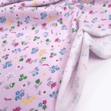 Jersey di Cotone H 140 cm - FIORI MULTICOLOR FONDO ROSA