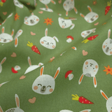 Tessuto Cotone H 140 cm - CONIGLIETTI E CAROTE/VERDE