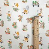 Tessuto Cotone H 140 cm - ANIMALETTI E NUMERI/AZZURO E TORTORA