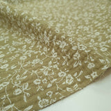 Mousseline imprimée - PETITES FLEURS BLANCHES/VERT OLIVE H 140 cm