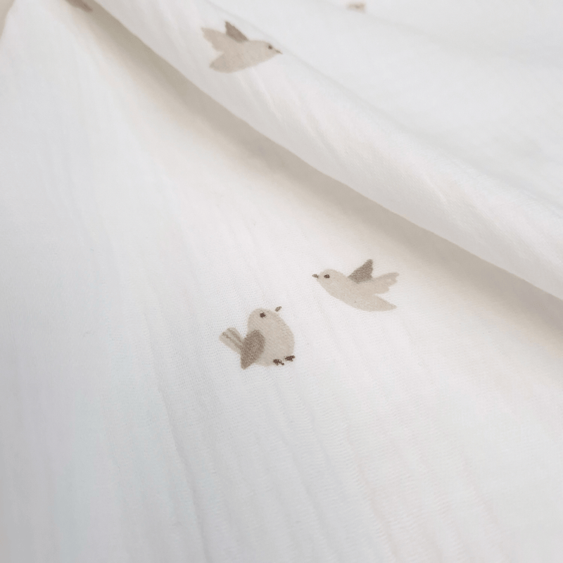 Mussola di Cotone Doppia Garza H 140 cm - UCCELLINI/LATTE