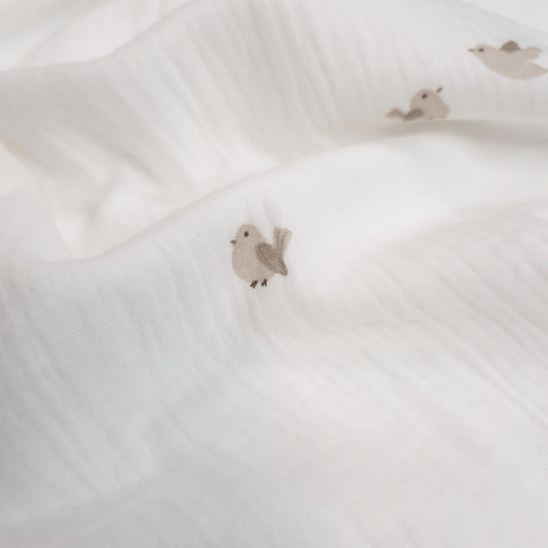 Mussola di Cotone Doppia Garza H 140 cm - UCCELLINI/LATTE