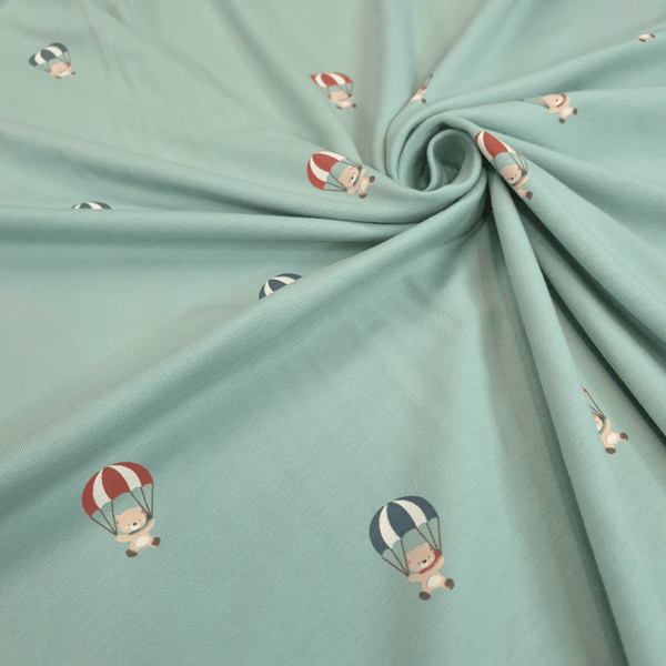 Jersey di Cotone H 150 cm - ORSETTI IN MONGOLFIERA/ACQUA MARINA