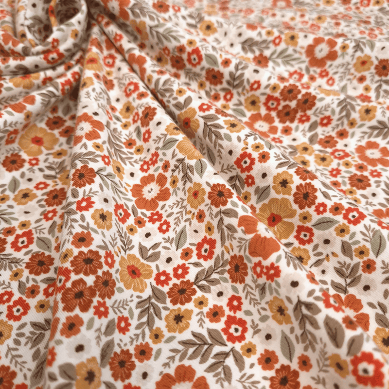 Jersey di Cotone H 150 cm - FIORELLINI RUGGINE/OCRA