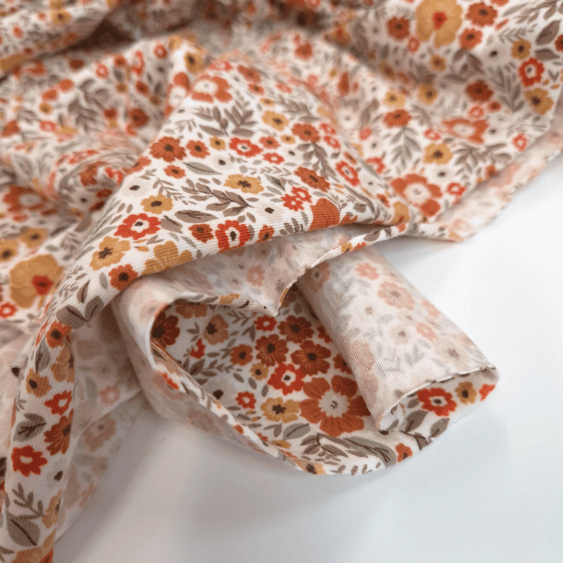 Jersey di Cotone H 150 cm - FIORELLINI RUGGINE/OCRA