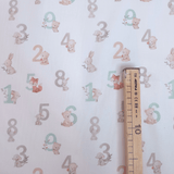 Tessuto Cotone "Collezione Baby Wonderland" H 145 cm - VERDE