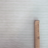 Tessuto Cotone "Collezione Baby Wonderland" H 145 cm - VERDE