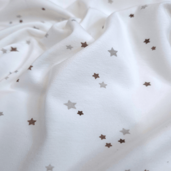 Jersey di Cotone H 150 cm - STELLINE/LATTE