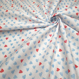 Tessuto Cotone H 150 cm - CUORI AZZURRI