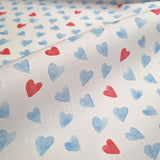 Tessuto Cotone H 150 cm - CUORI AZZURRI